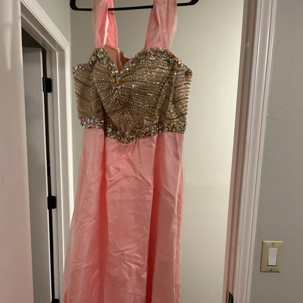 Pretty in pink dress. Lots of gems in top
